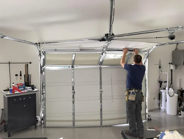 Pine Hills Garage Door Repair specialist performing precise section replacement on Pine Hills garage door
