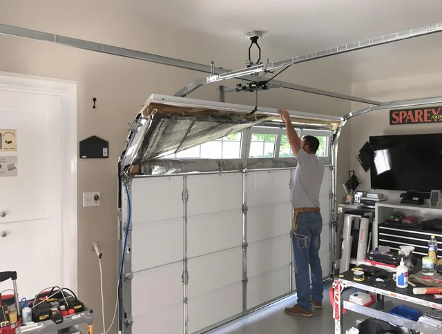 Garage door section replacement by Pine Hills Garage Door Repair in Pine Hills