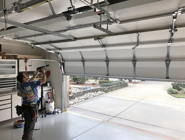 Garage door track repair service by Pine Hills Garage Door Repair in Pine Hills